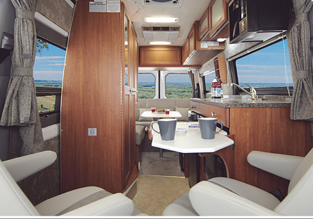 Interior like this 2013 Road Trek can be found at See Grins RV in Gilroy CA